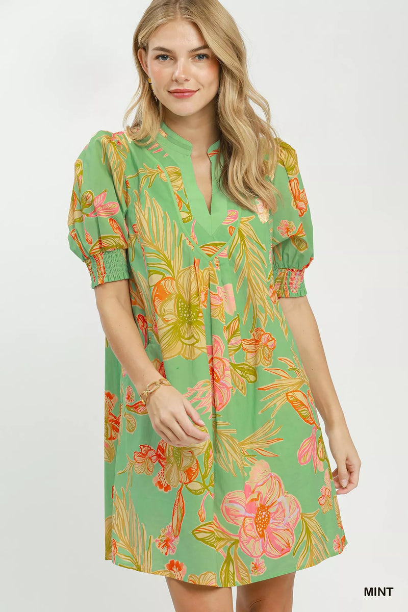 Mint botanical print boho dress with smocked cuffs front view