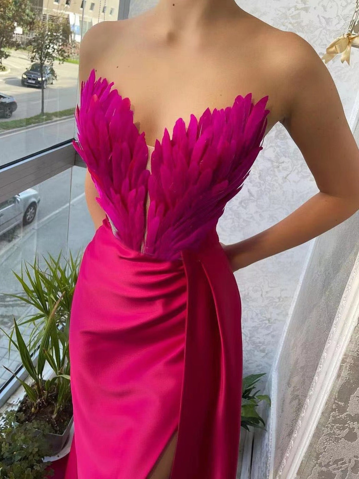 feather trim slit maxi dress walking pose