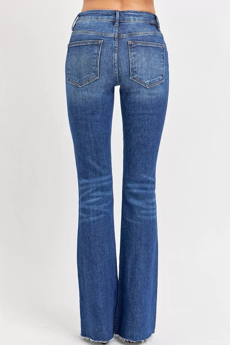 RISEN distressed flare jeans raw hem detail