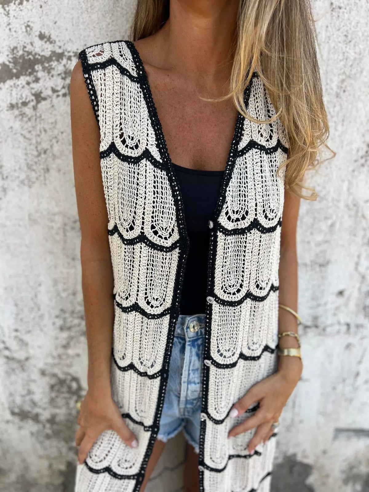 Close up of the openwork crochet and lace detail