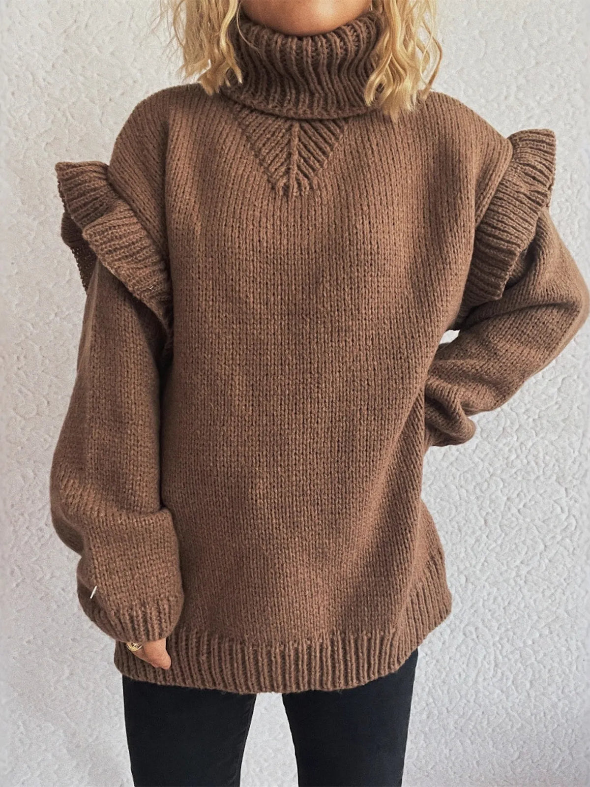Ruffled turtleneck long sleeve sweater on model