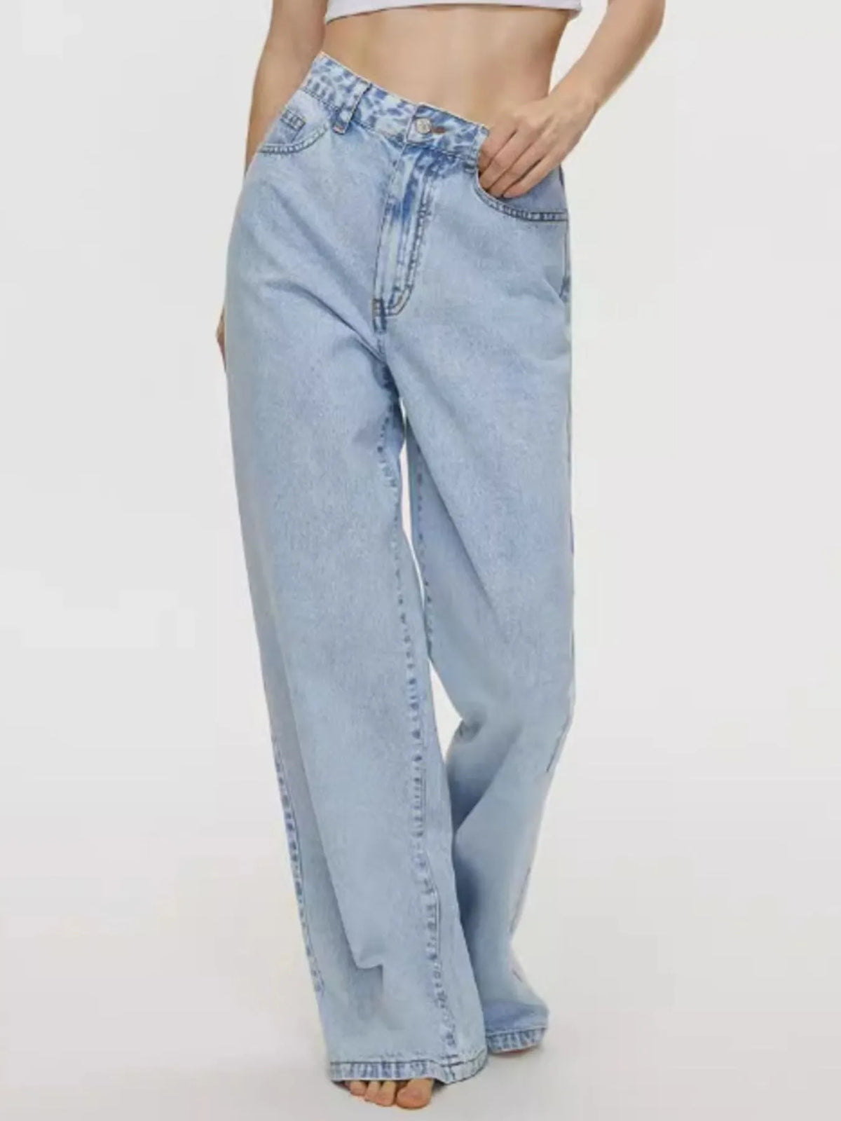 Wide leg jeans showing clean button front
