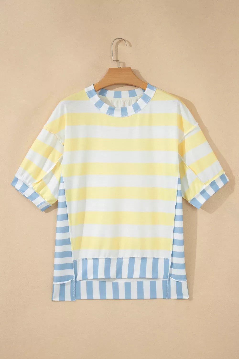 Half sleeve detail on the light yellow striped top