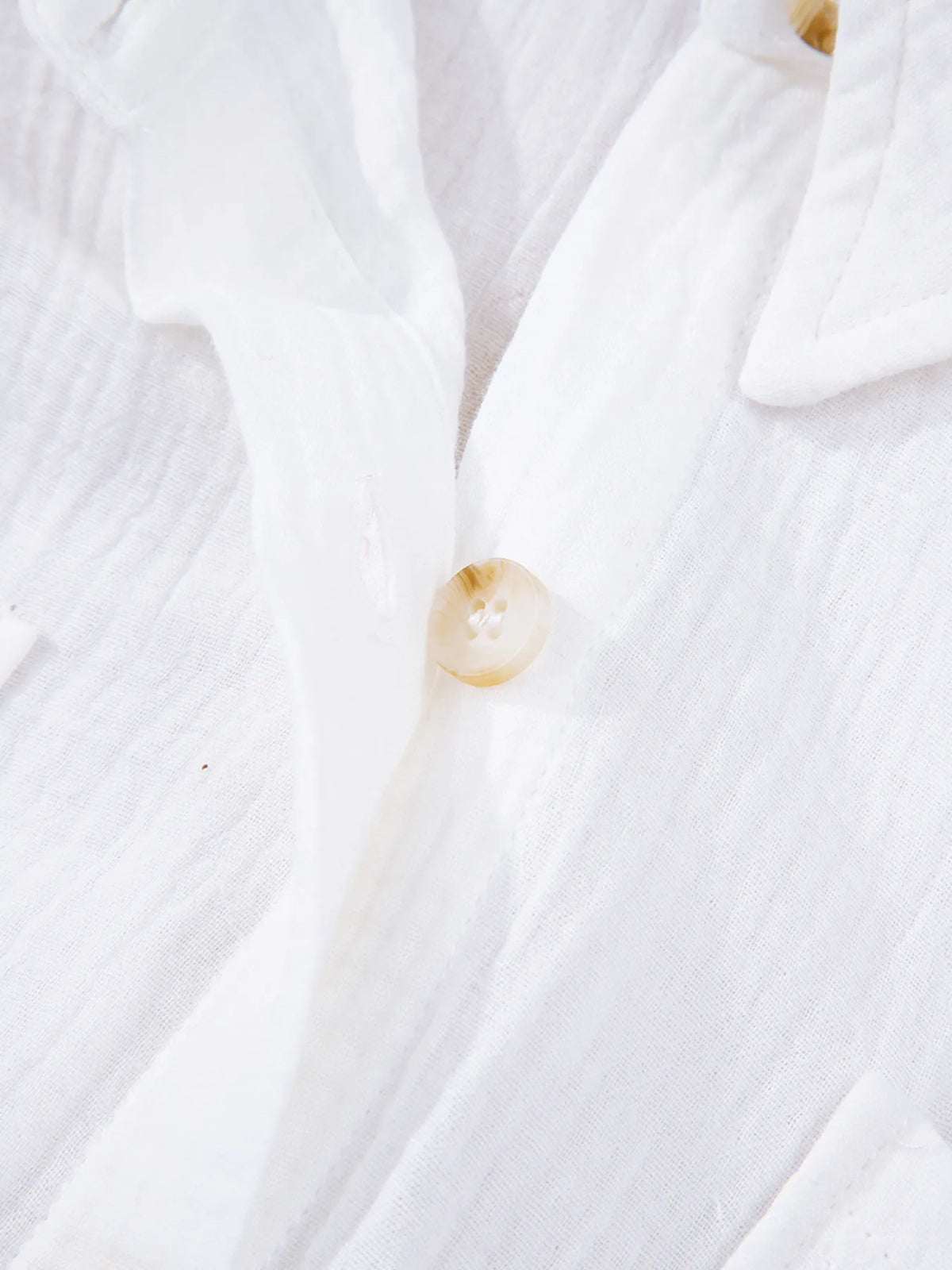 Lace detail button down shirt fabric close up