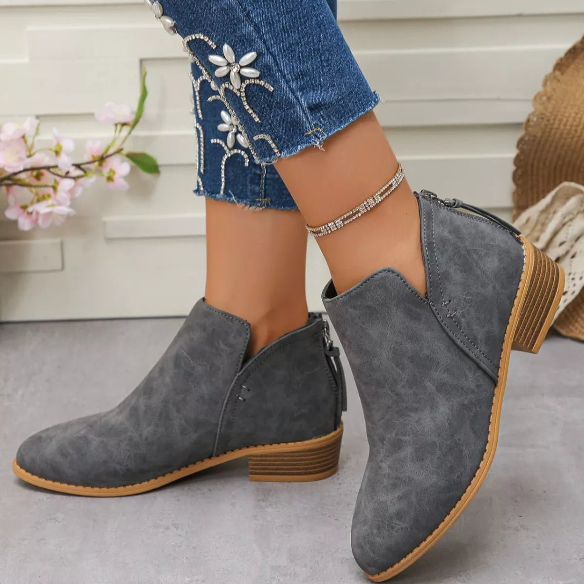 Point toe block heel ankle boots sole view
