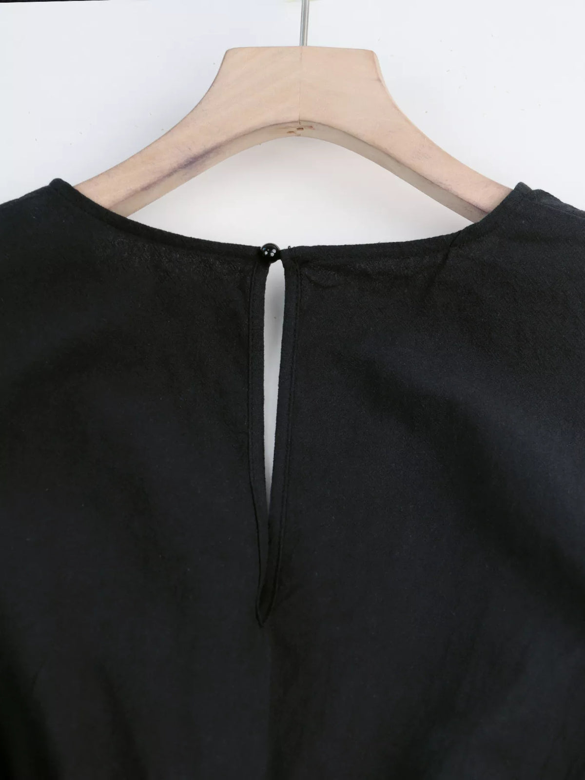 Tie waist flutter sleeve romper, detail view