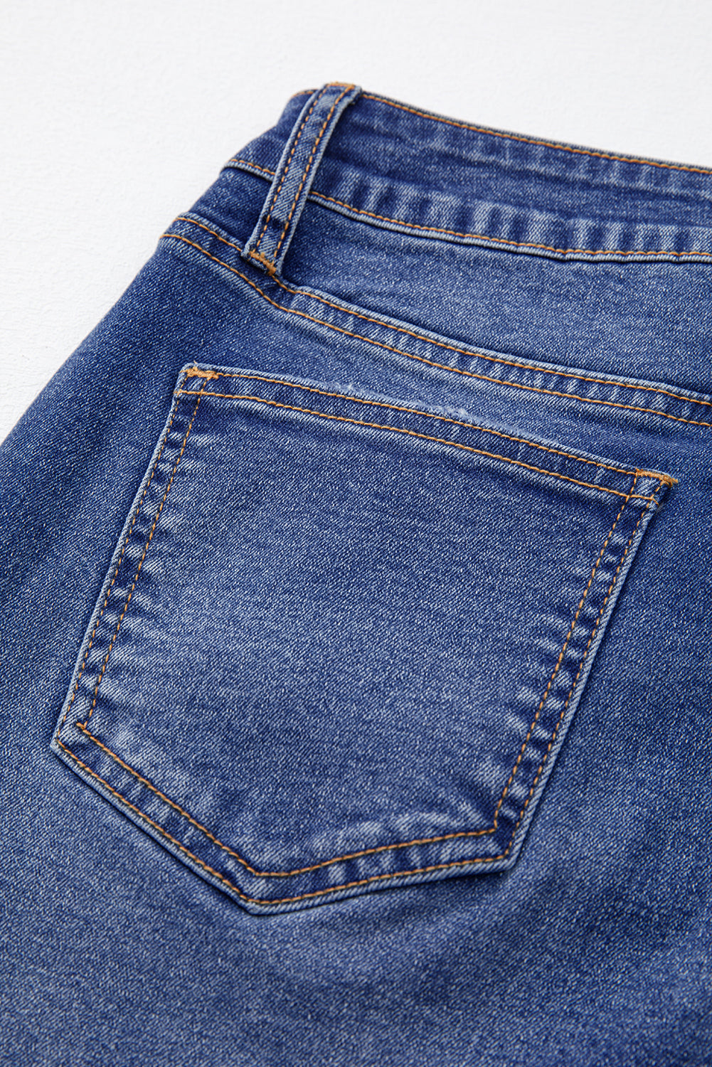 Cropped slim fit jeans pocket detail