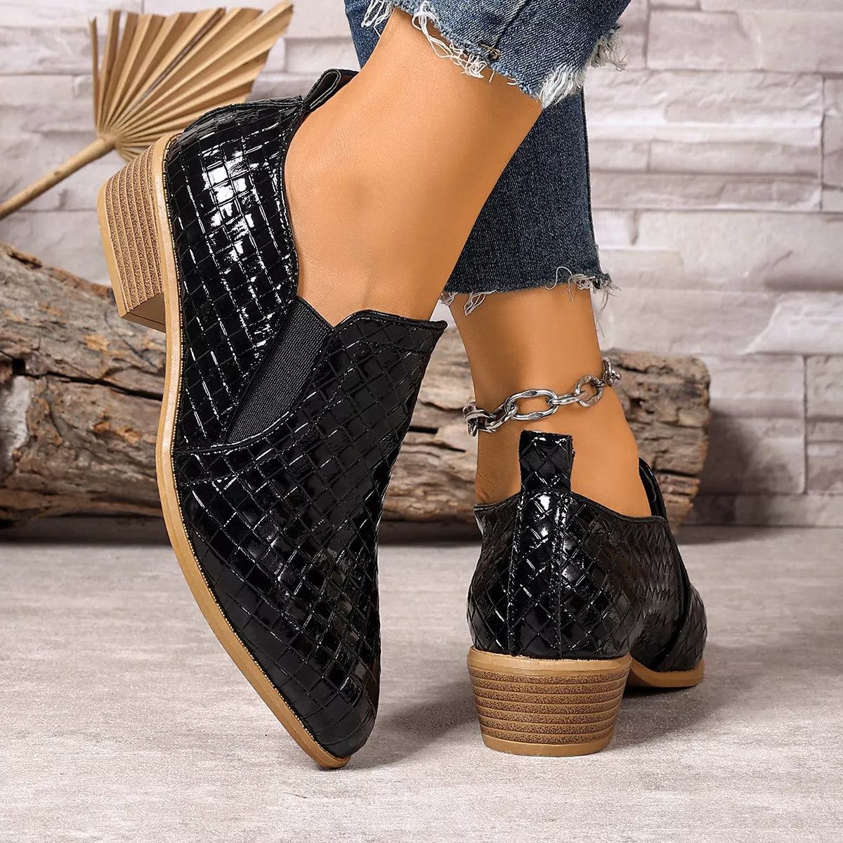 Black point toe block heels ankle boots front facing view