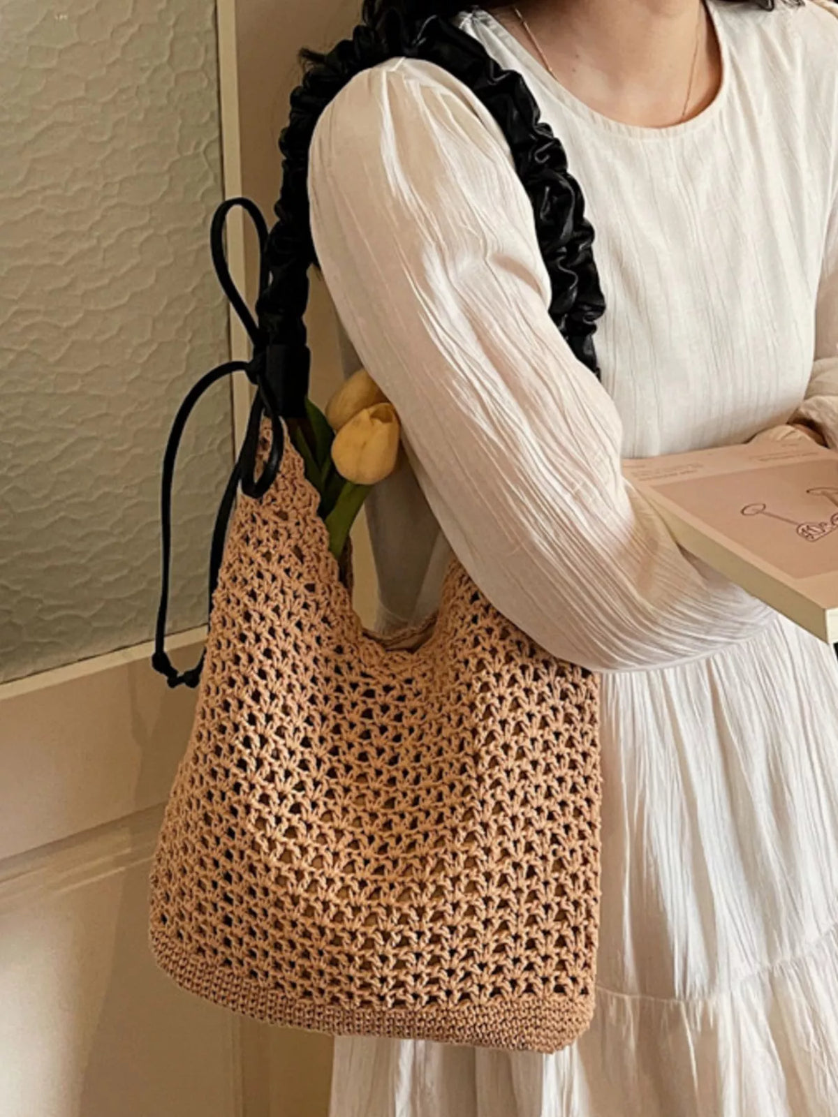 Interior view of khaki straw shoulder bag