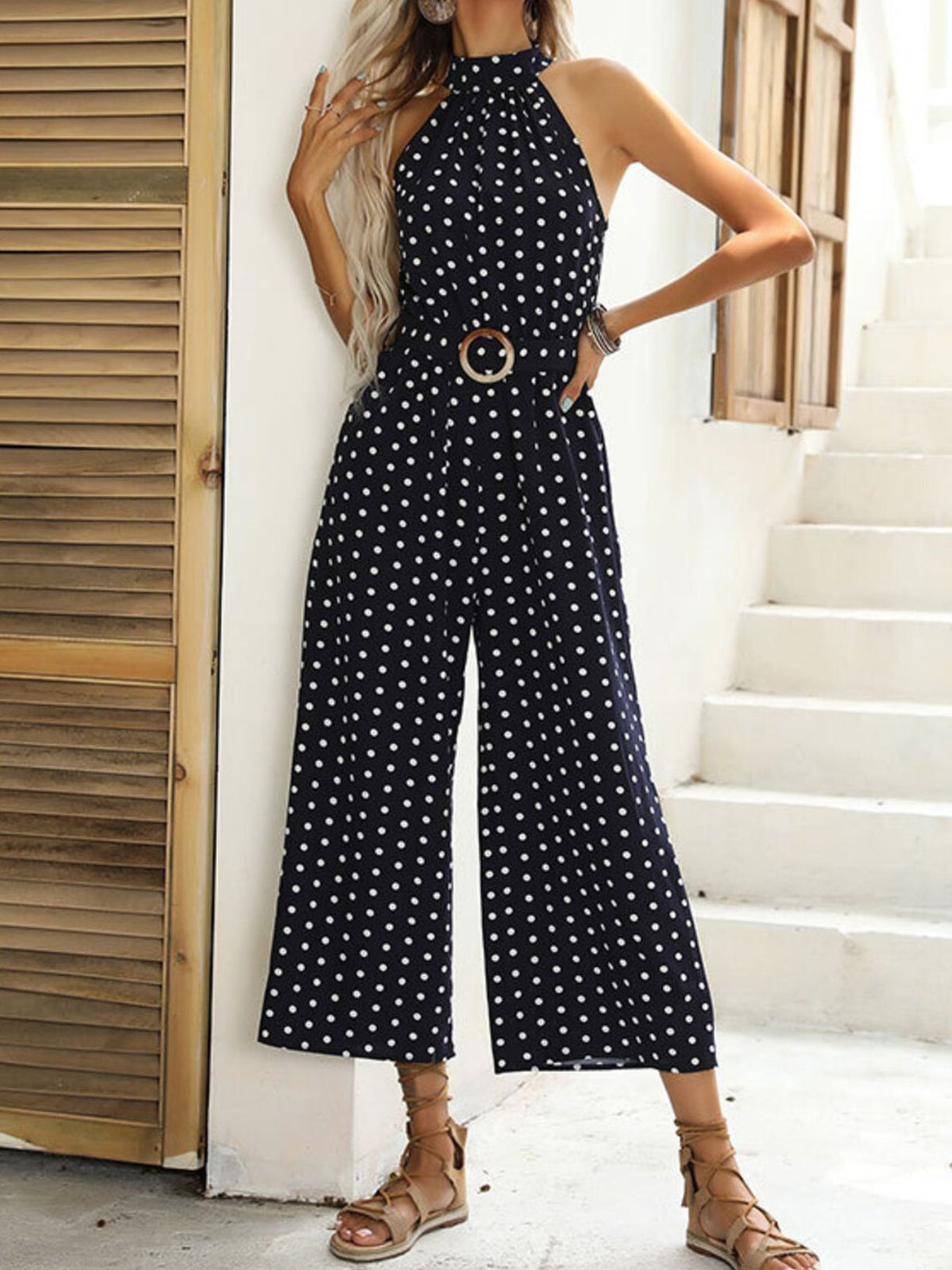 Three quarter view of the polka dot jumpsuit