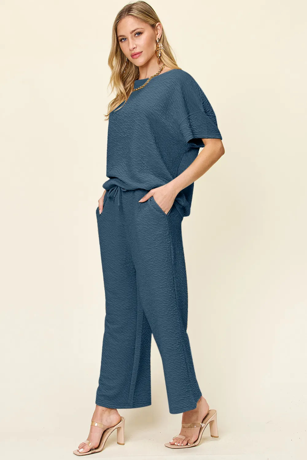 Textured short sleeve top styled with matching pants