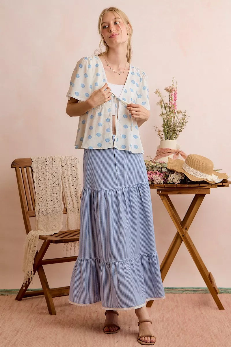 Ivory and blue shell print tie front flutter sleeve blouse styled view