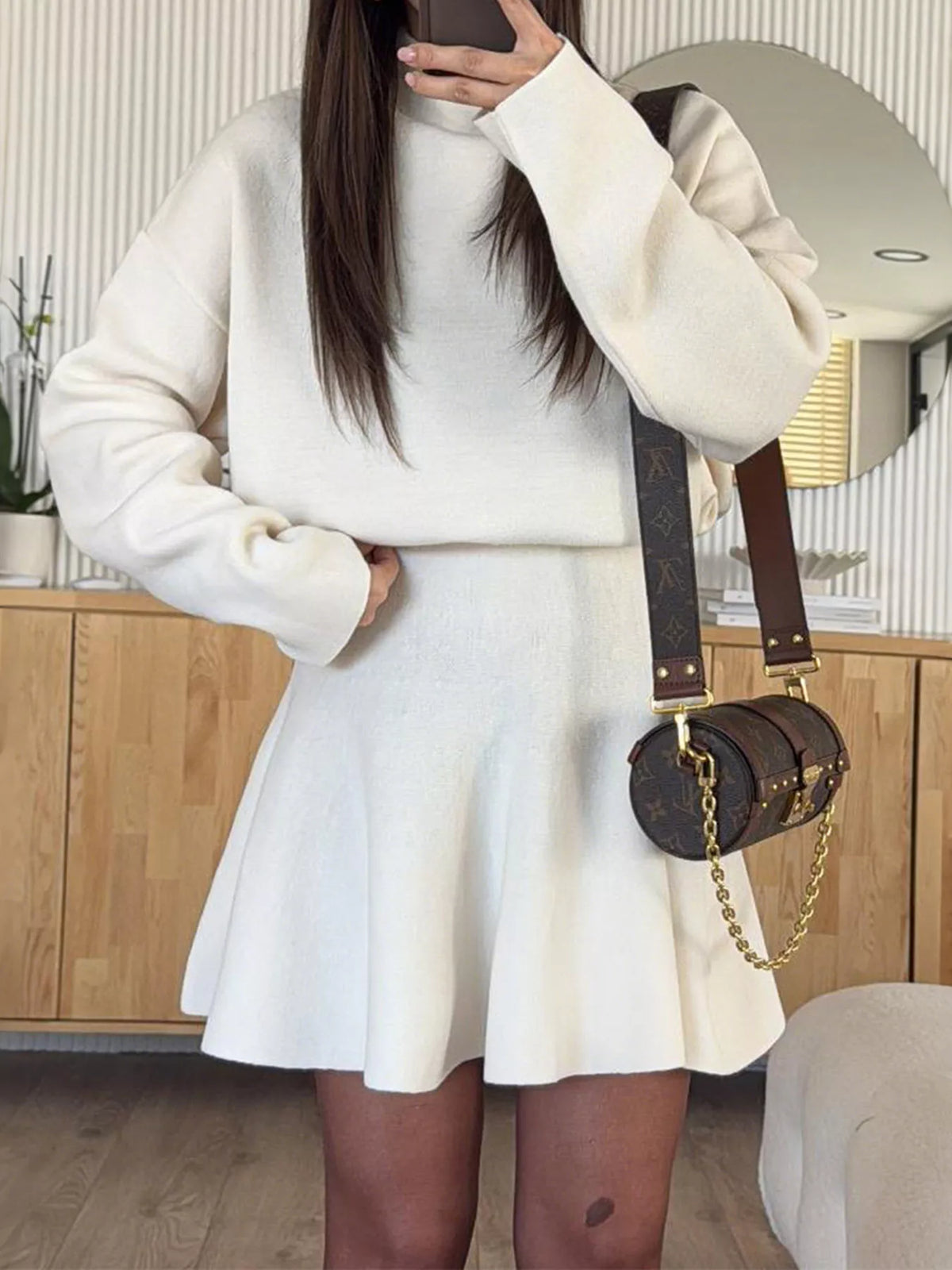 Round neck long sleeve sweater dress styled front view