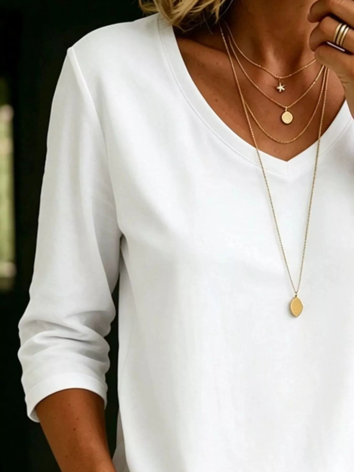 Black v neck three quarter sleeve tee, front view