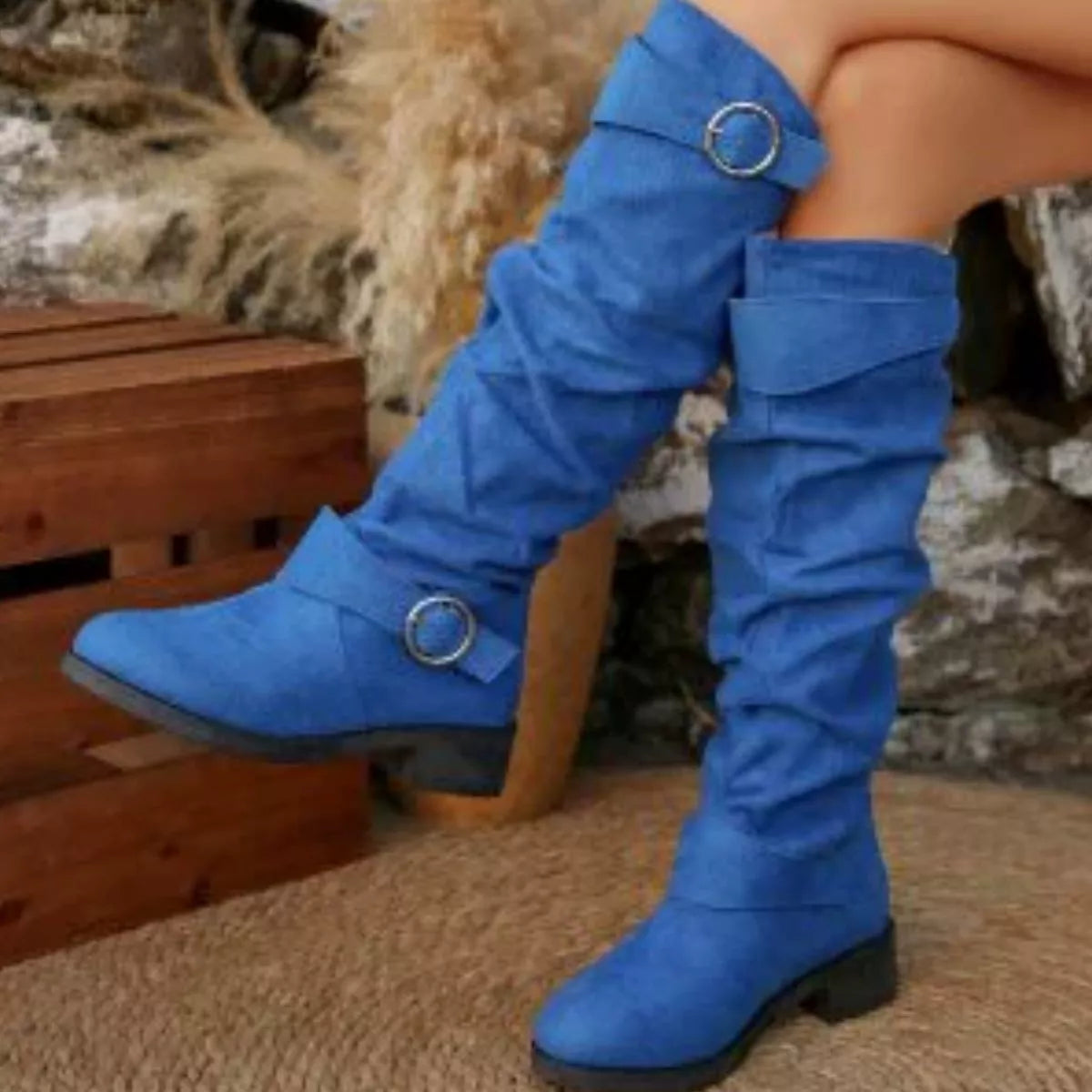 Black buckle accent slouch boots side profile view