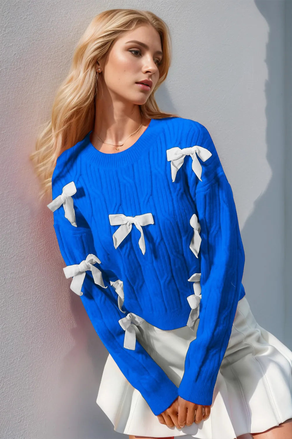 Bow detail cable knit sweater side view