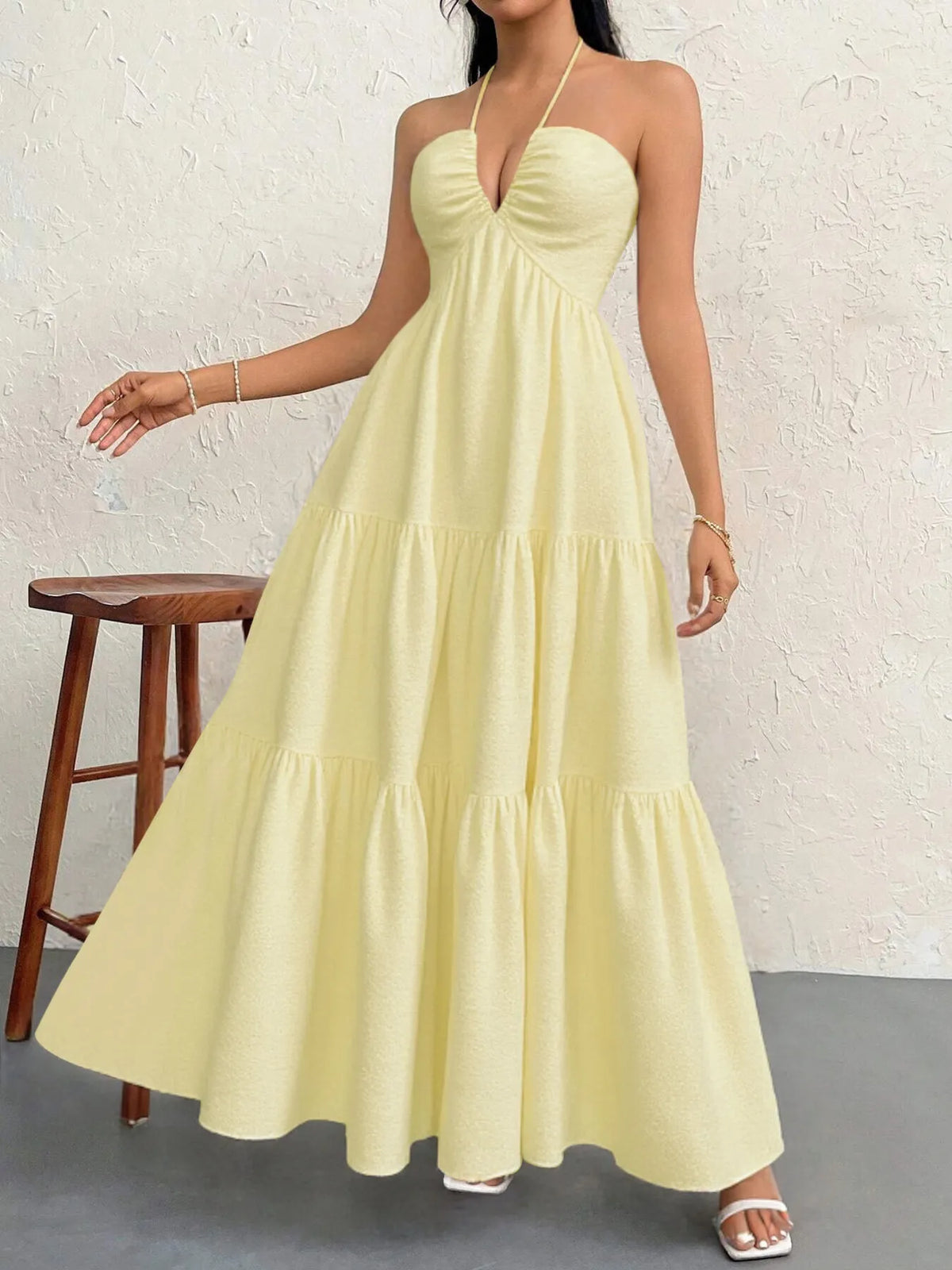 halter neck tiered backless maxi dress three quarter view
