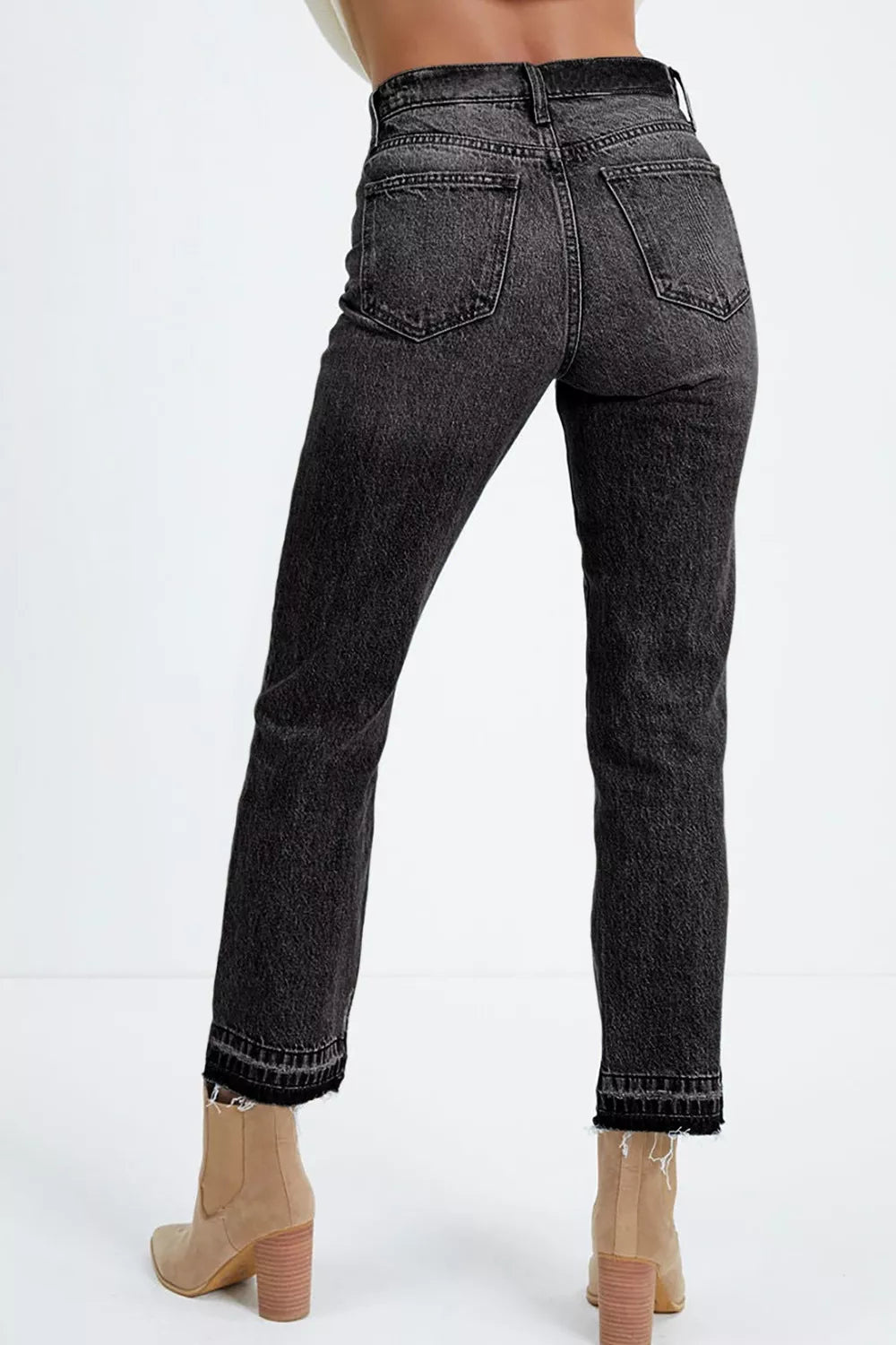 Black straight leg jeans side profile showing high waist
