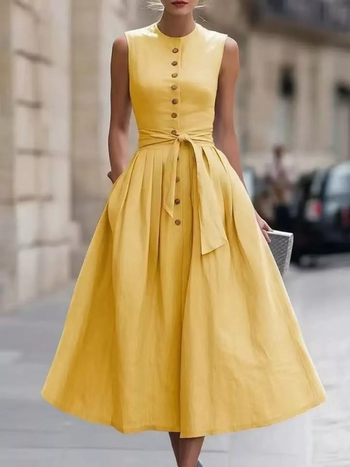 Detail of the buttons down the front of the midi dress