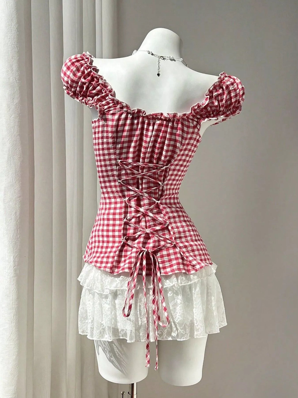 Cap sleeve and frill detail close up