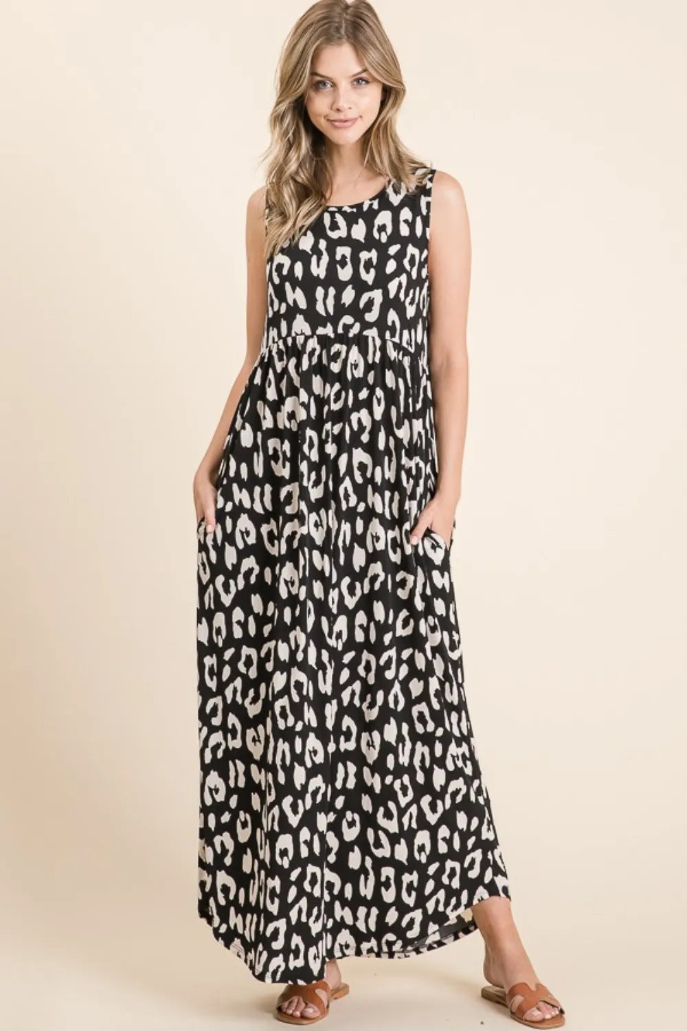 Black leopard print maxi dress with pockets front view