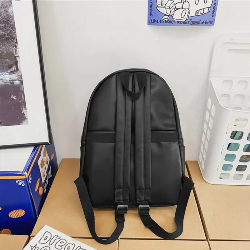 Faux leather zip backpack zip and hardware detail