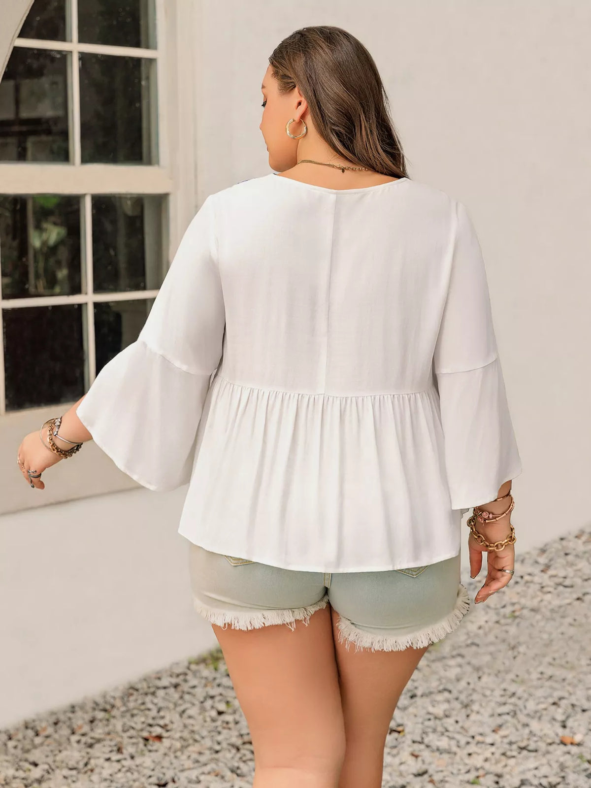 Plus size geometric flare sleeve blouse back view