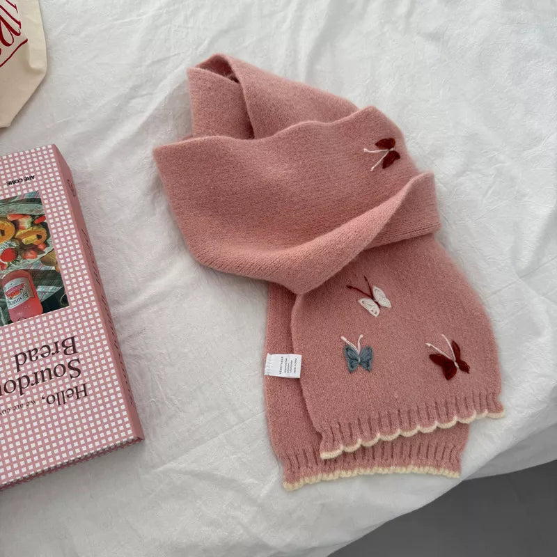 Butterfly embroidered knitted scarf shown fully draped