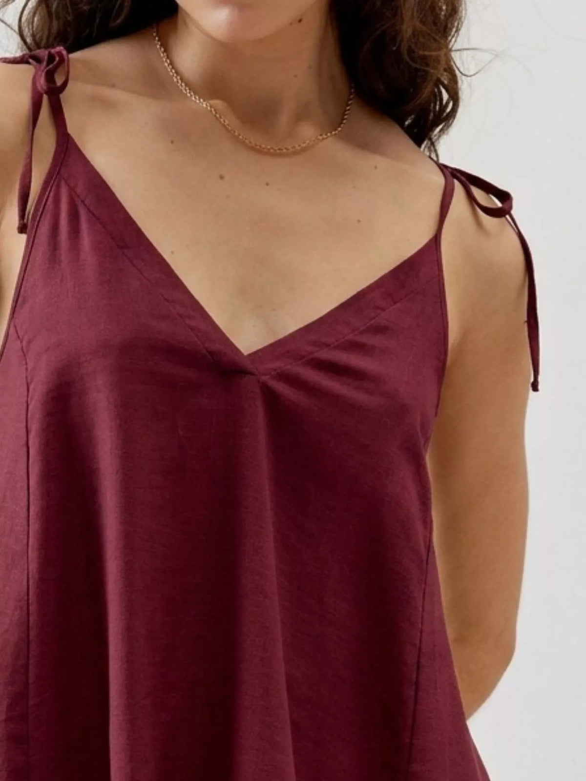 Tie strap ruffle hem cami side view