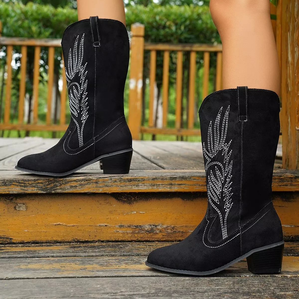 Point toe block heel boots, heel detail