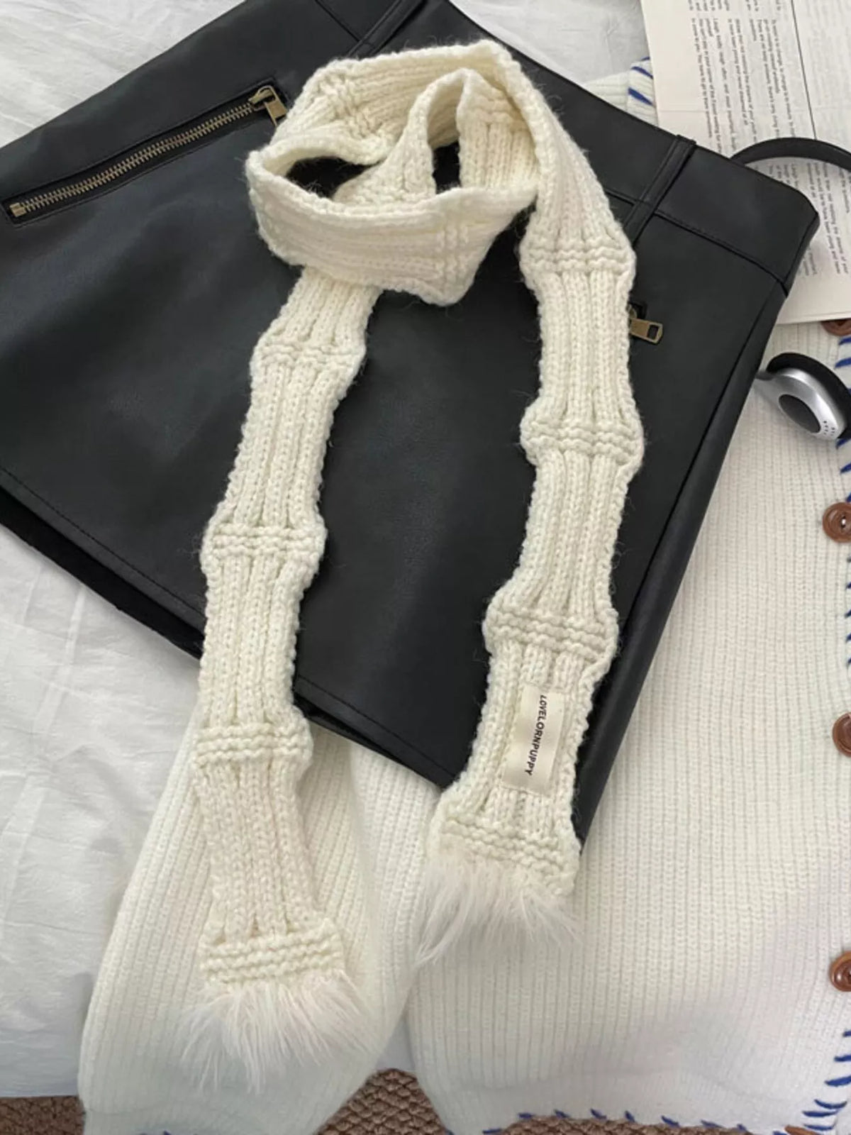 Knitted scarf trim detail