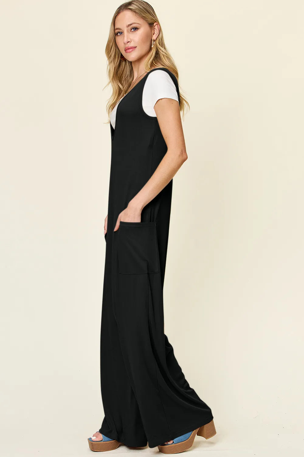 Side view of the sleeveless jumpsuit