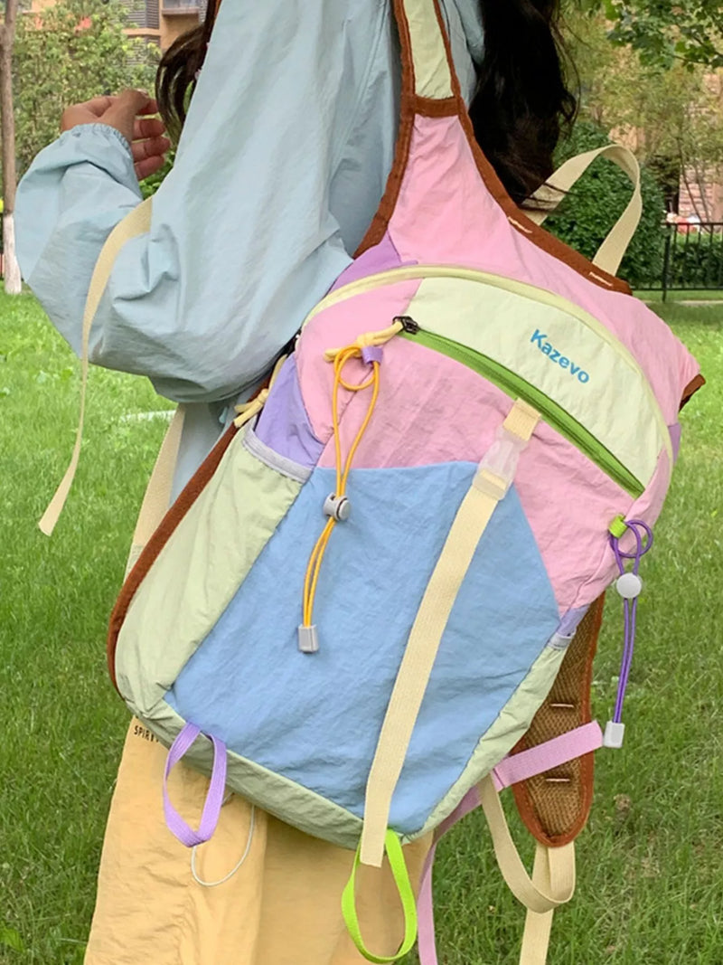 Pastel blue color block backpack front view