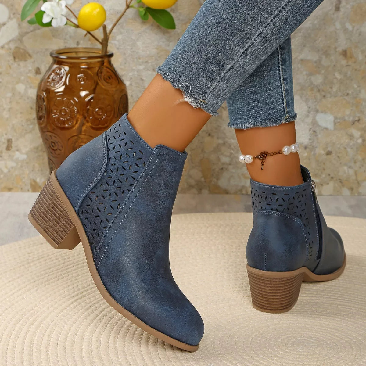 Point toe block heel boots angled pair view