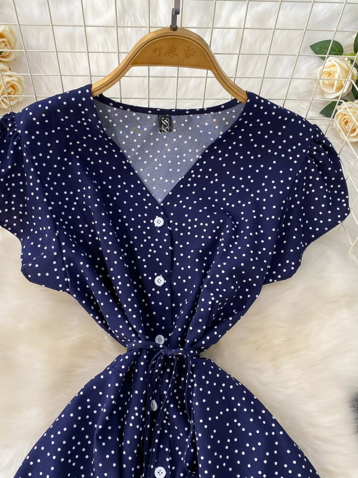 Dark blue polka dot maxi dress belt and button detail