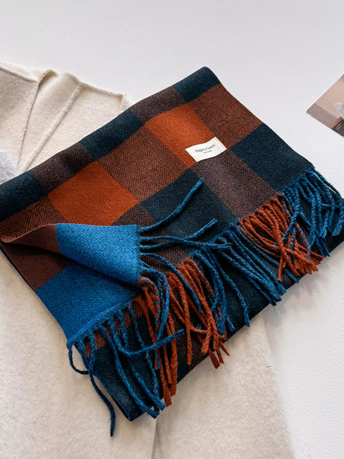 Heritage plaid scarf styled with knit
