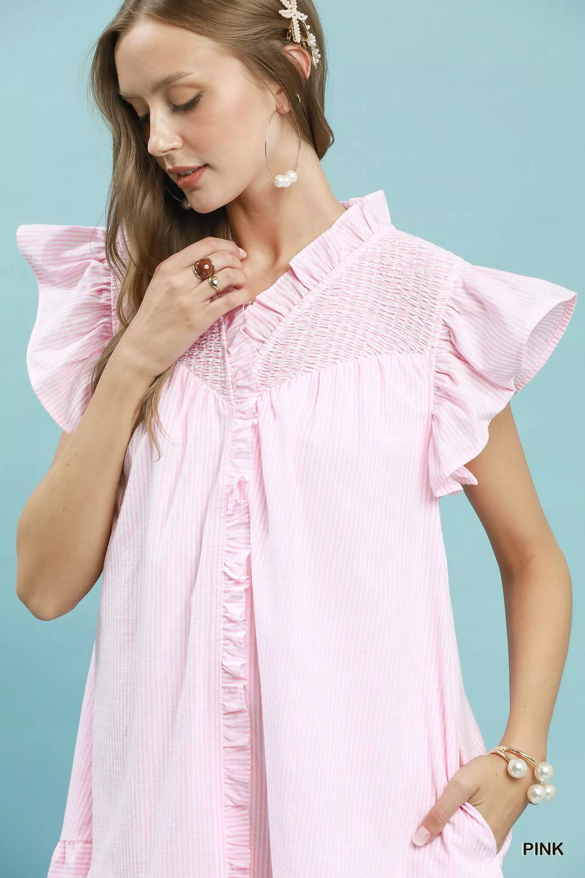 Pink striped smocked yoke ruffle dress styled view