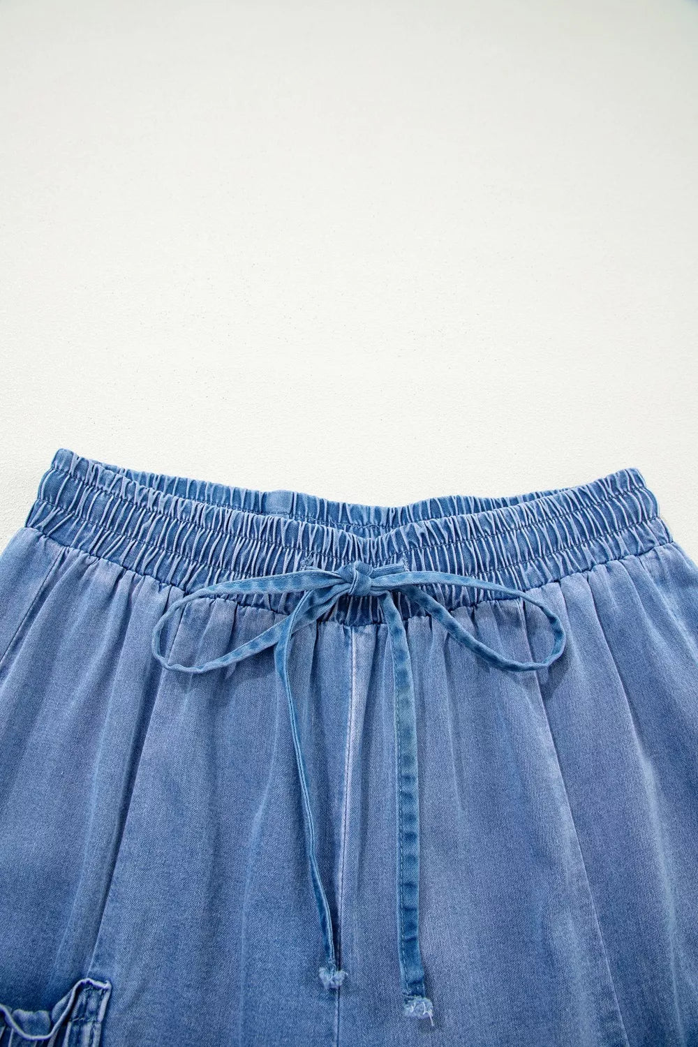 Pocket detail on loose fit jeans