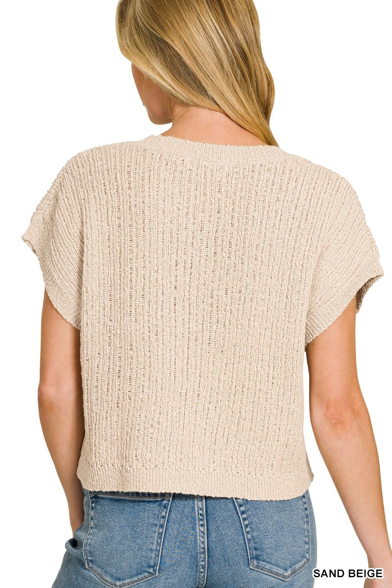 Beige cropped sweater styled look