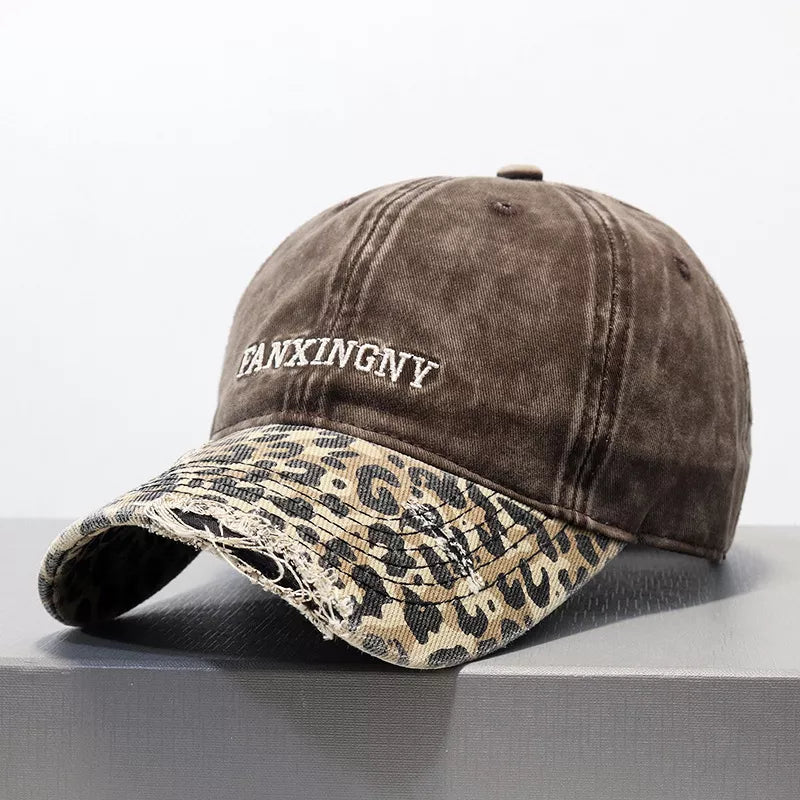 Distressed leopard baseball cap shown from a side angle