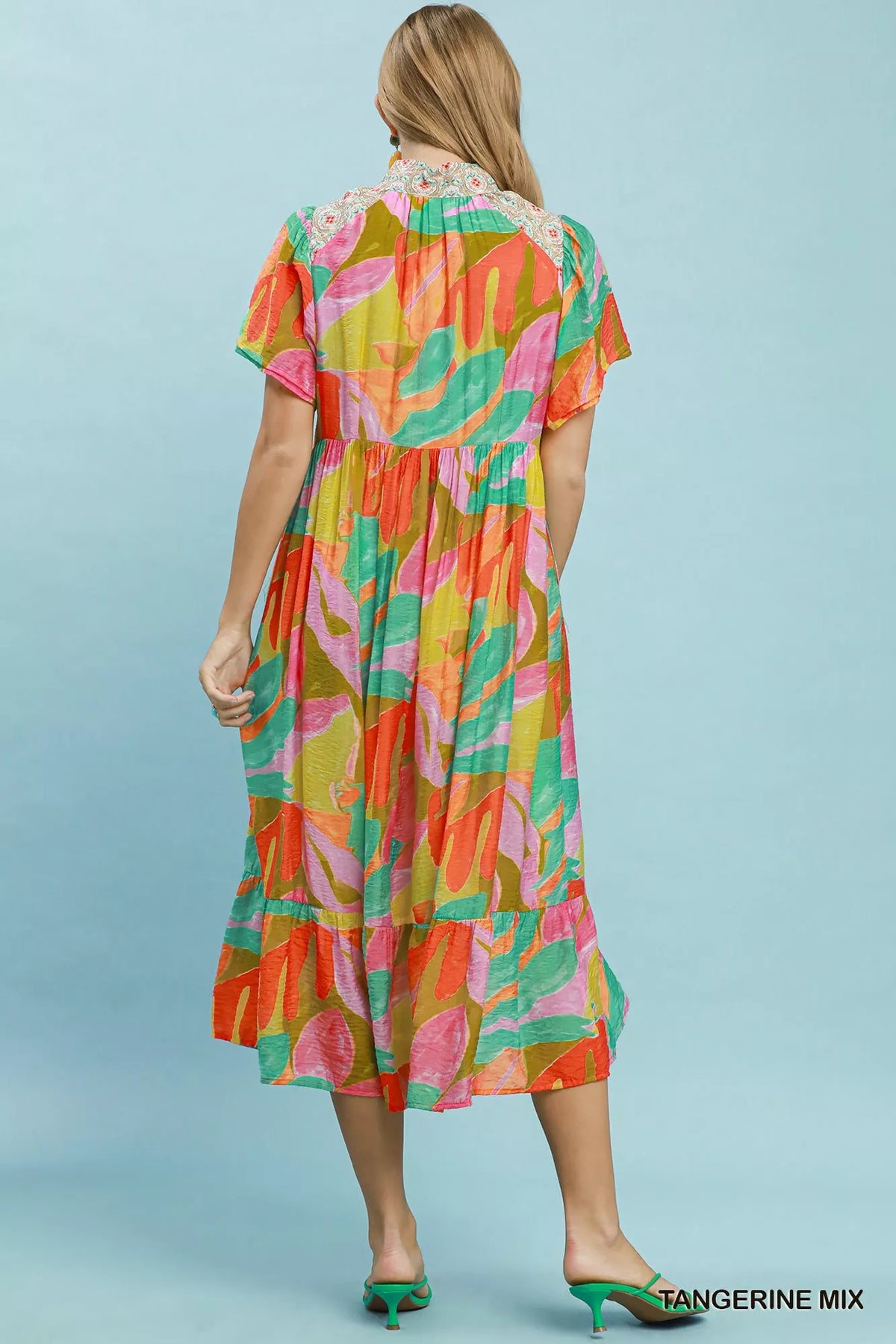 Orange tropical print tiered midi dress side view