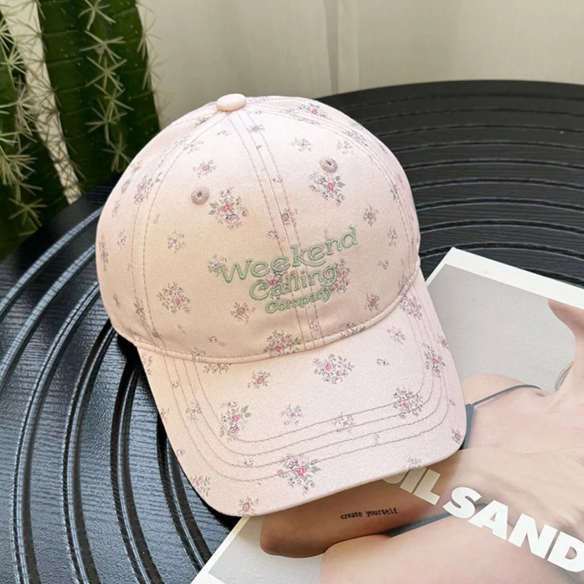 Curved brim detail on the floral baseball cap