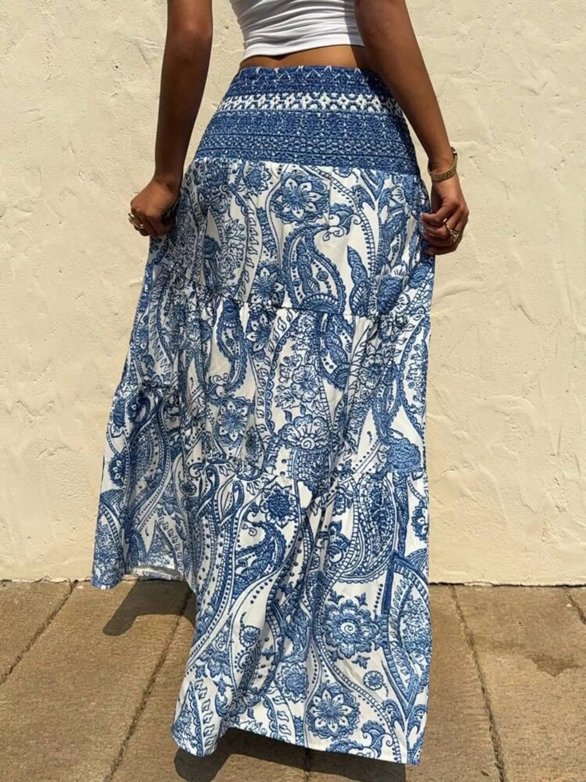 Blue paisley print tiered maxi skirt back view