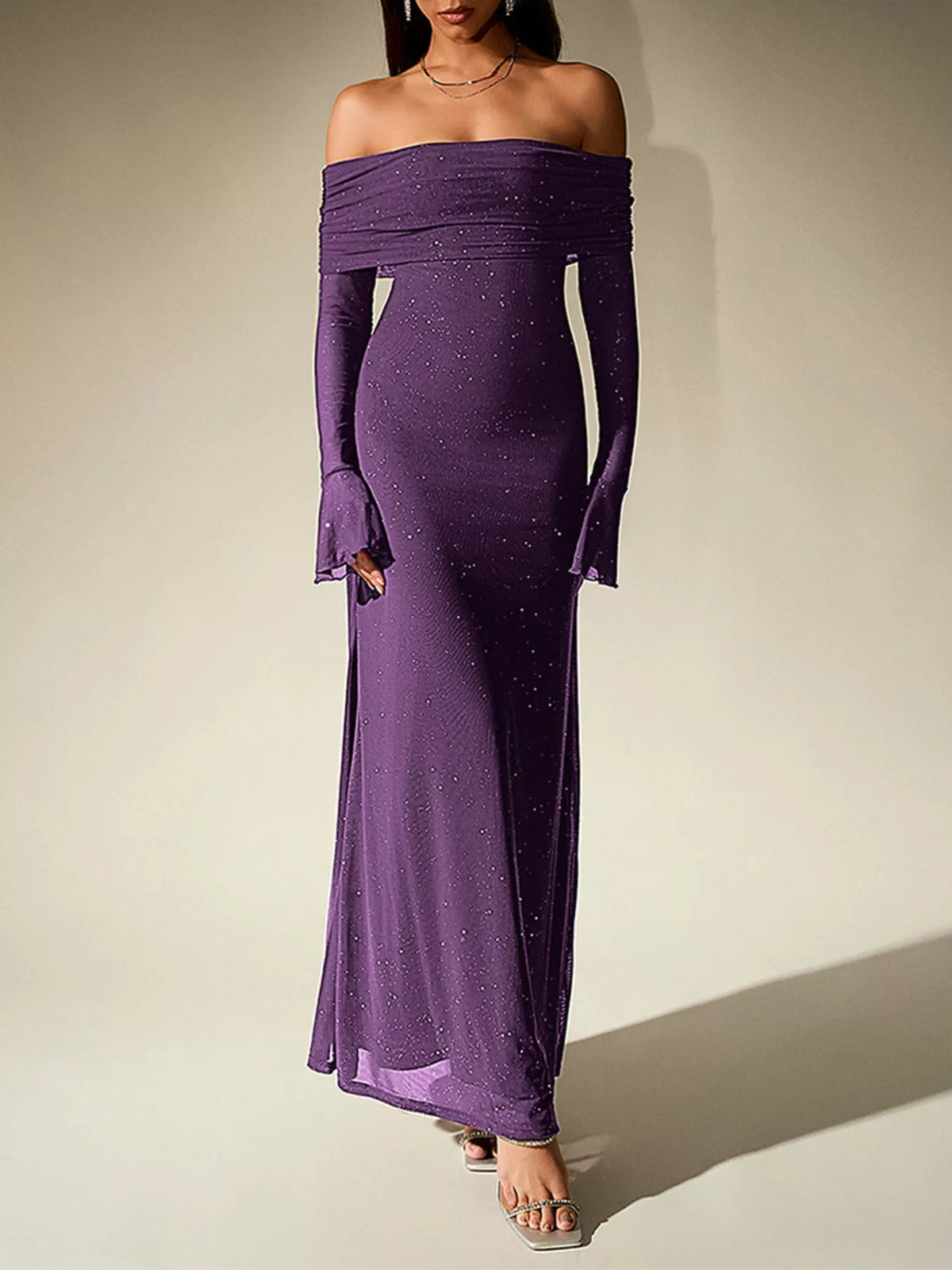 glitter off shoulder maxi dress standing pose