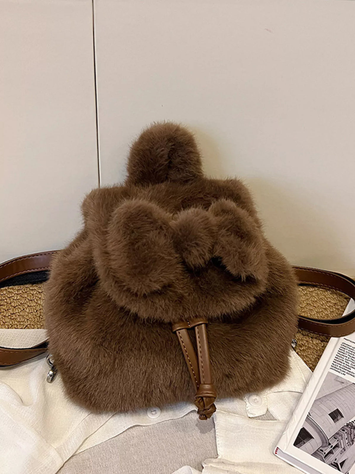Plush backpack interior opening