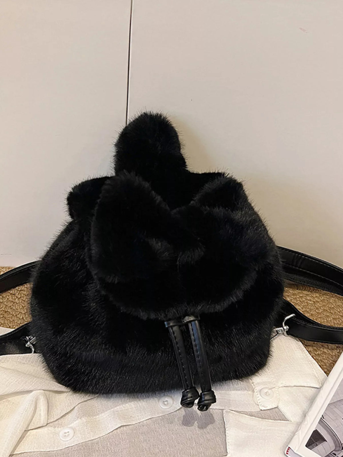 Plush backpack shoulder straps detail