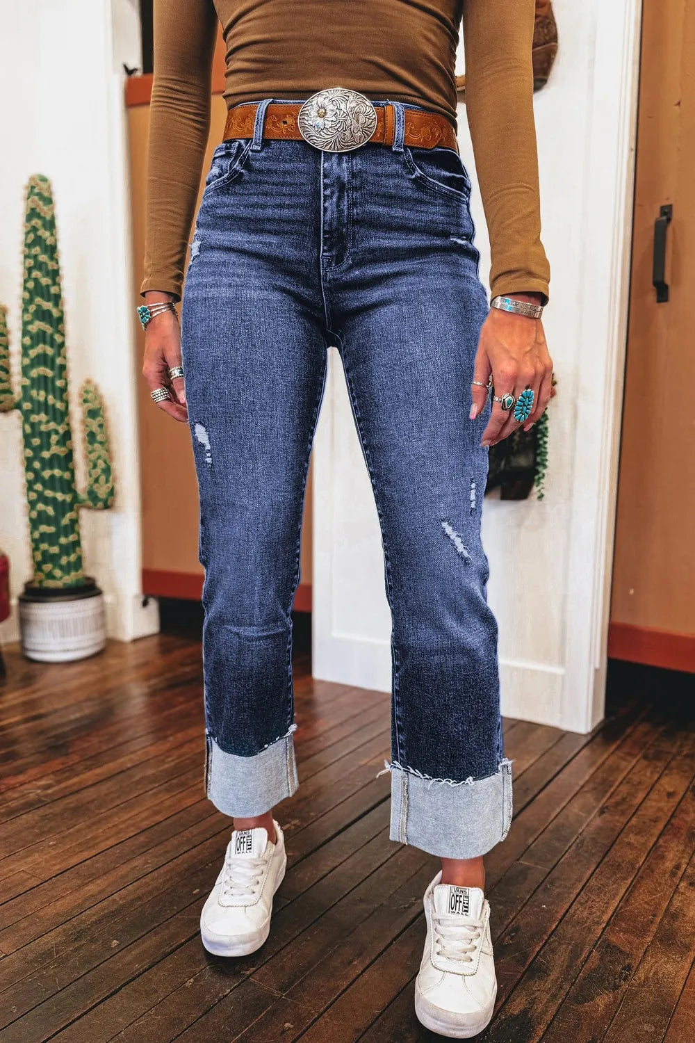 Distressed straight jeans with folded cuffs front view