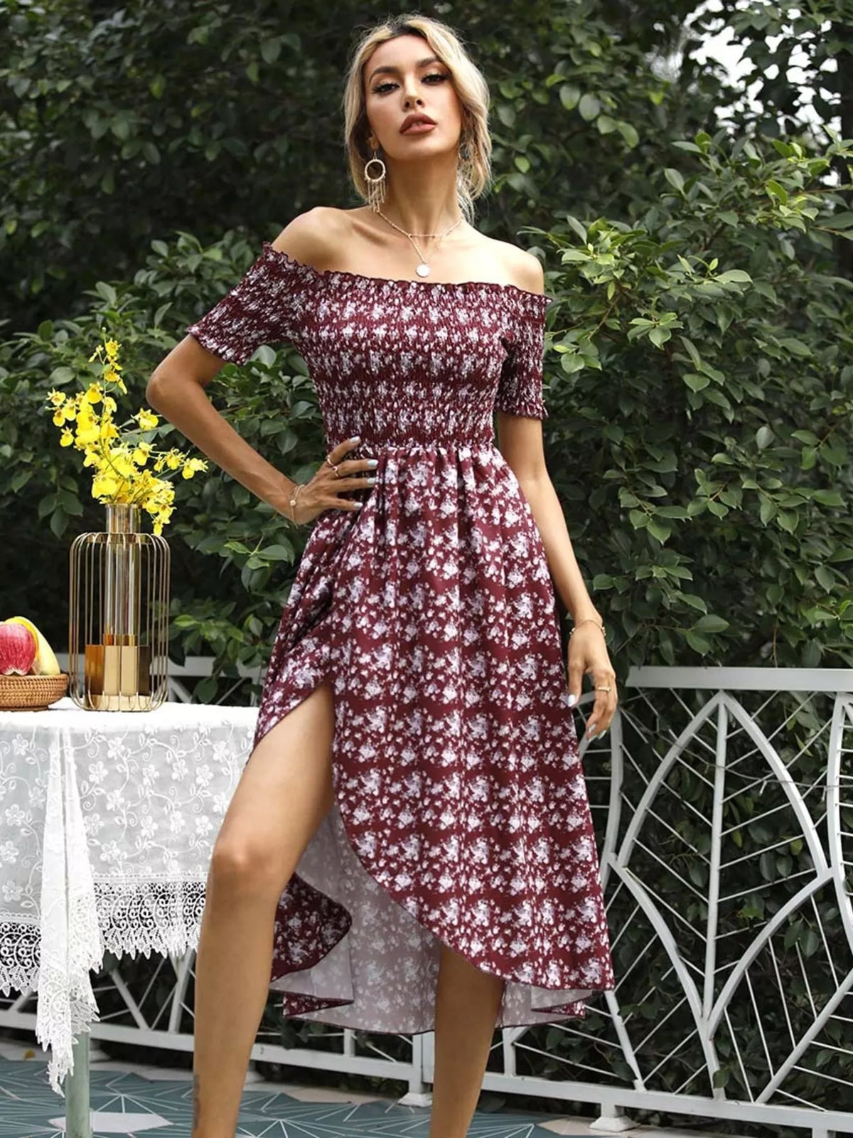 Off shoulder floral dress styled with a heeled sandal