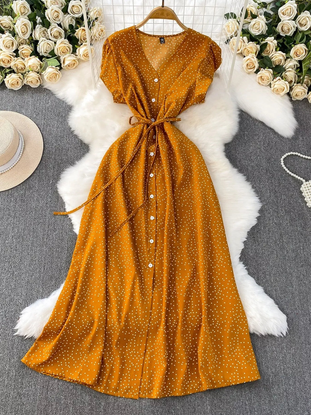 Dark yellow polka dot button up belted maxi dress front view