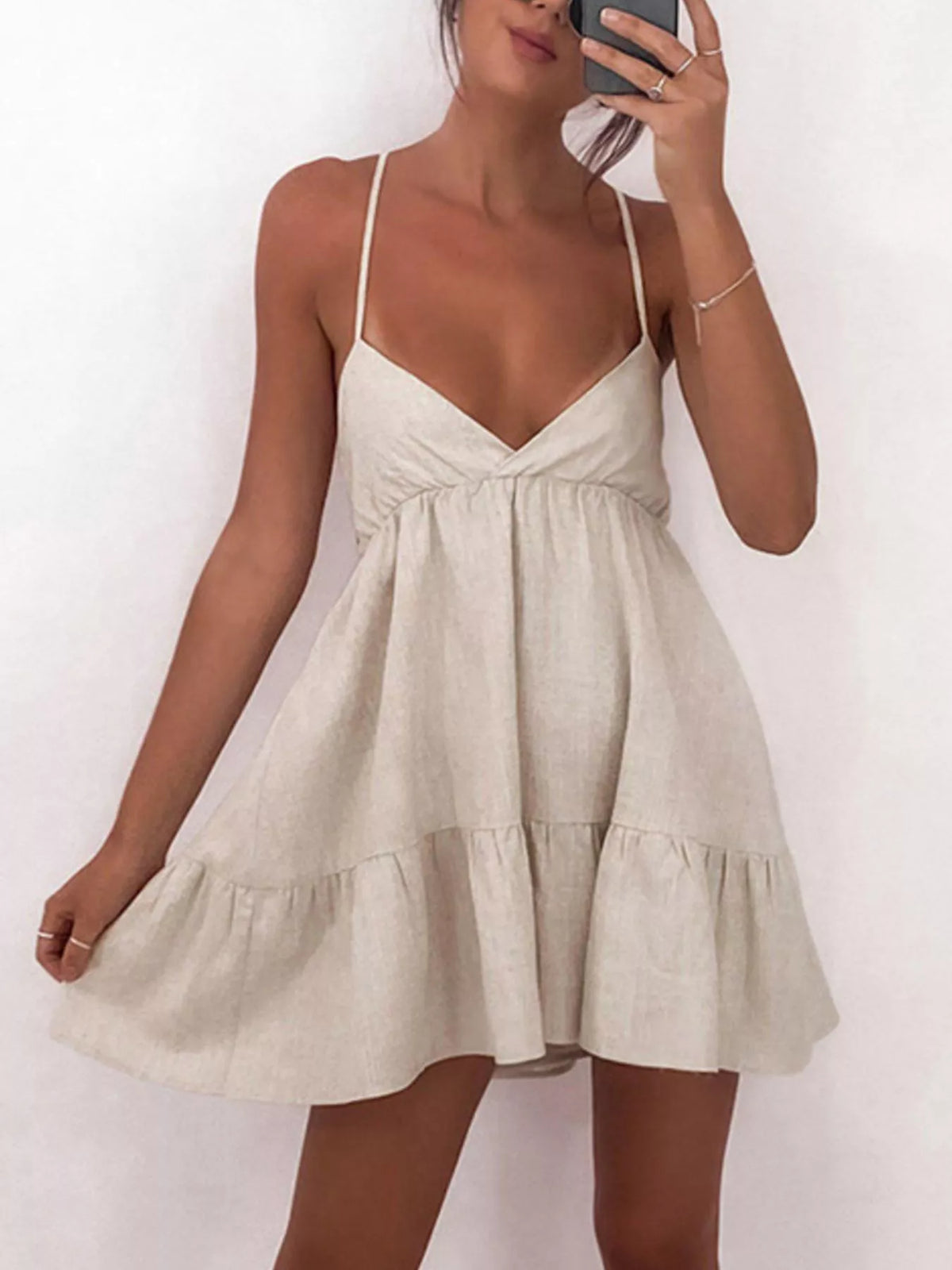 Crisscross tie detail on the open back of the dress